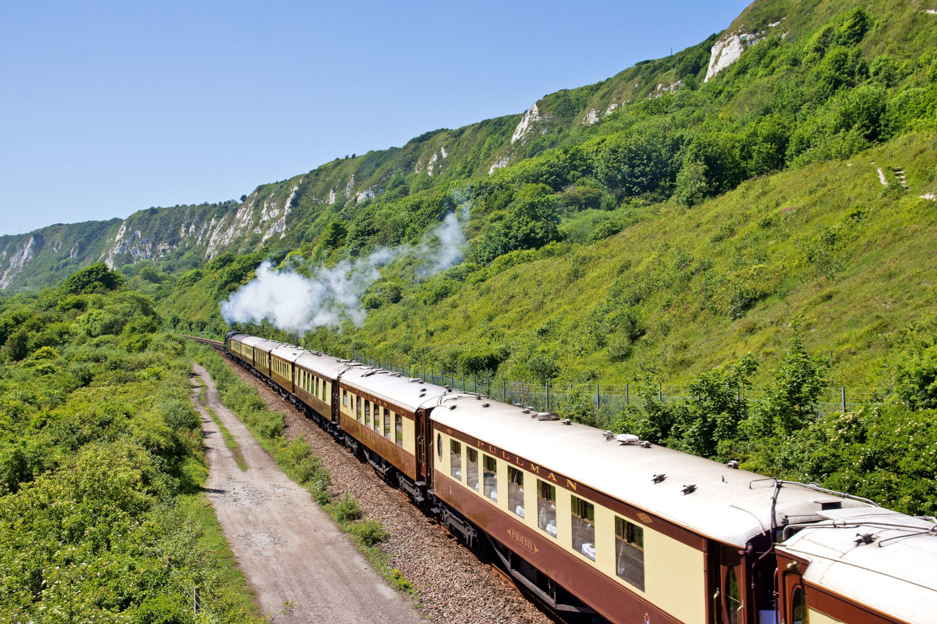 Train running through countryside