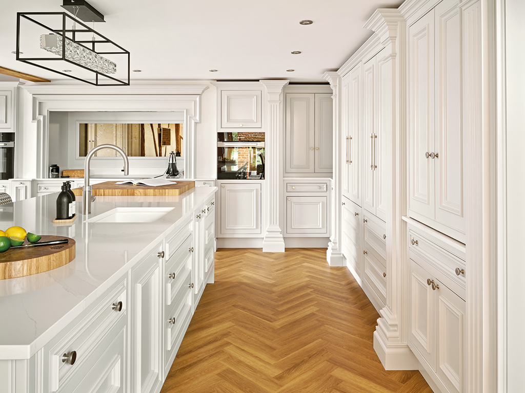 A white wood kitchen designed by Clive Christian