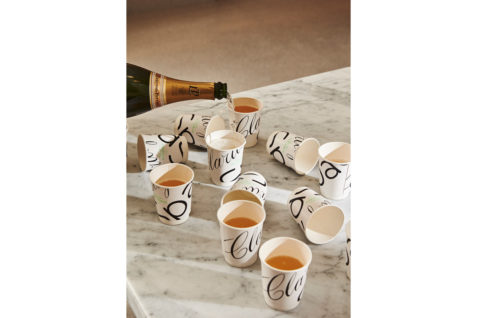 Champagne served in takeaway cups at Claridge's