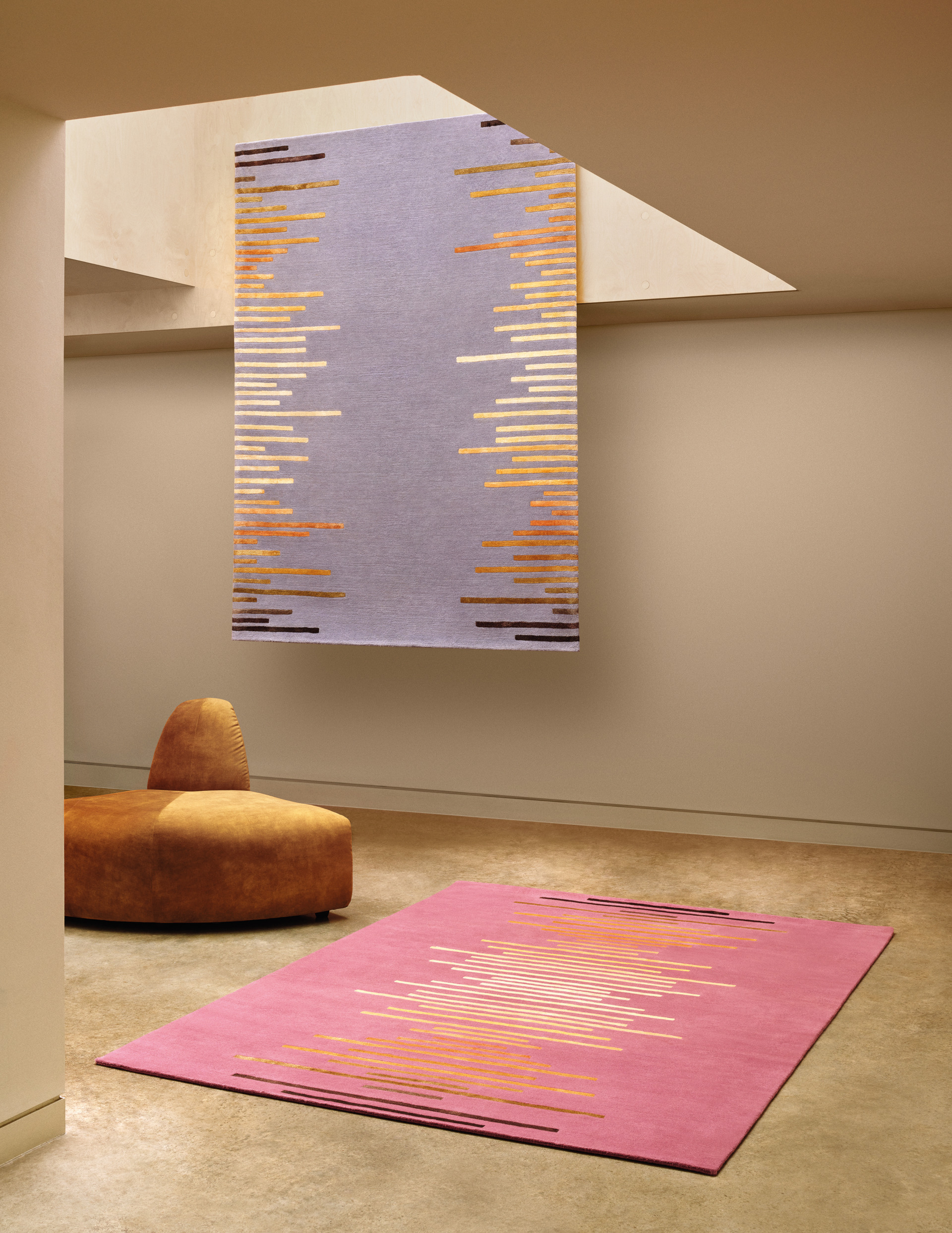 Room with rugs on the floor and wall