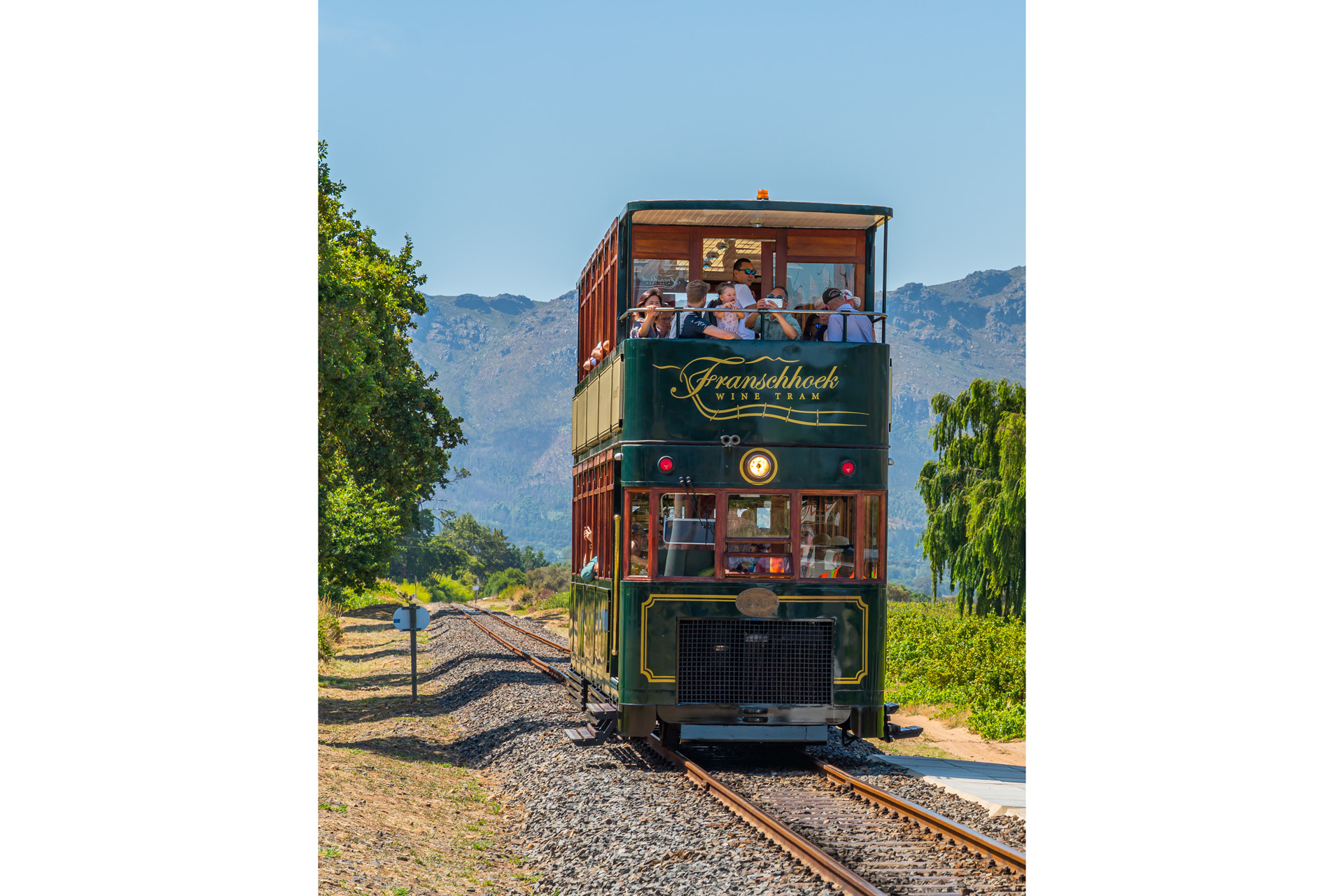A tram arrive at Rickety Bridge Winery Railway Station, Franschhoek where Tourist take a Wine Tasting Tour