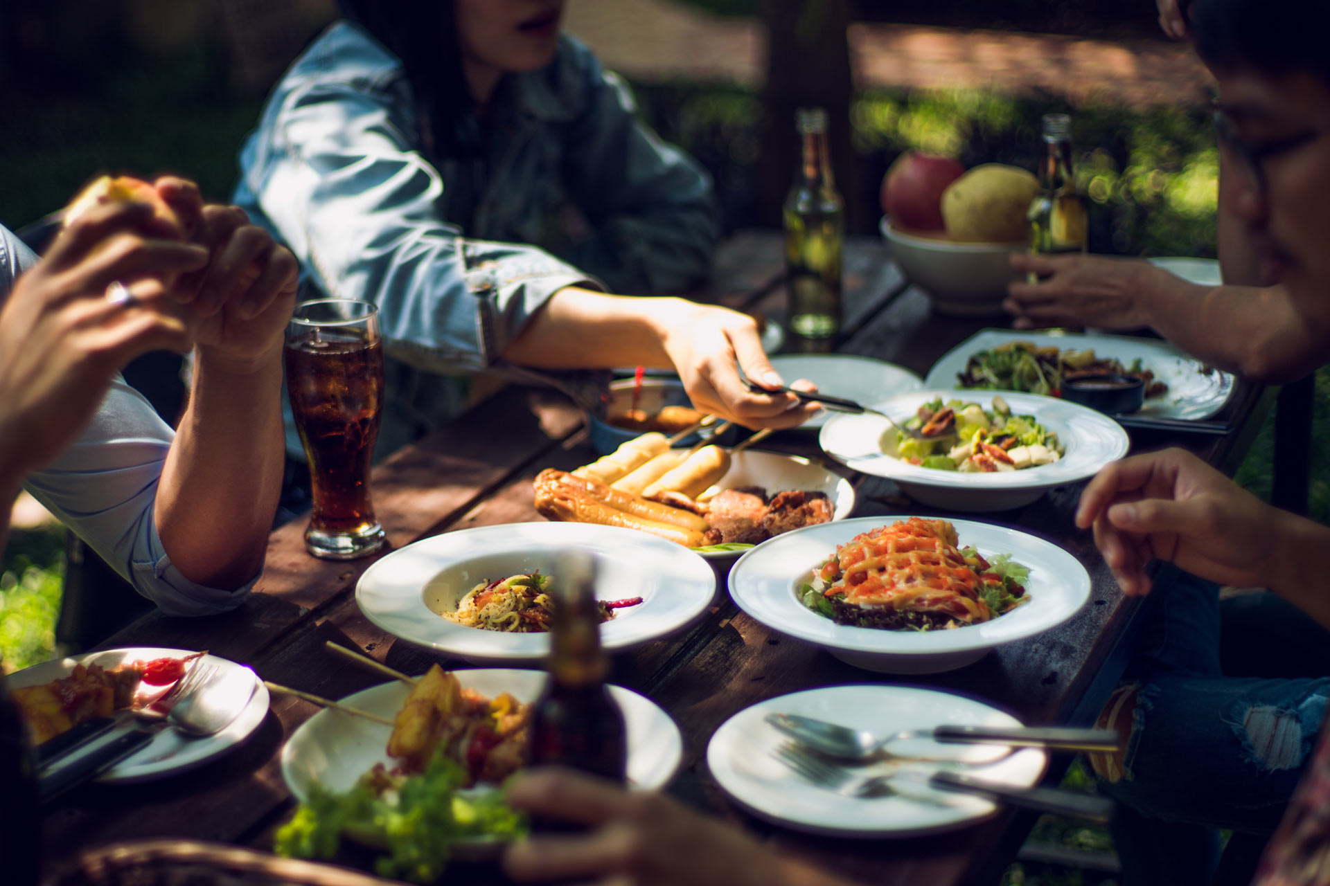 Group of friends eating outside