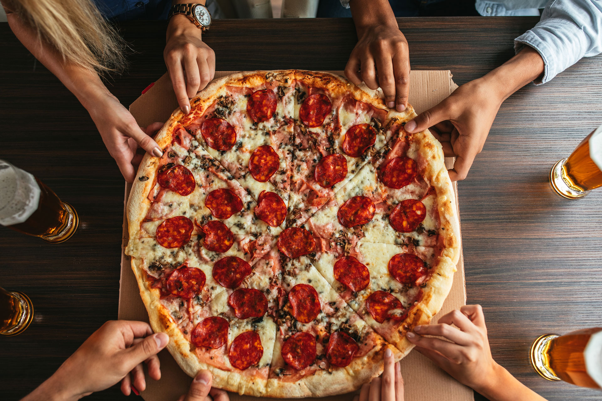 People eating pizza