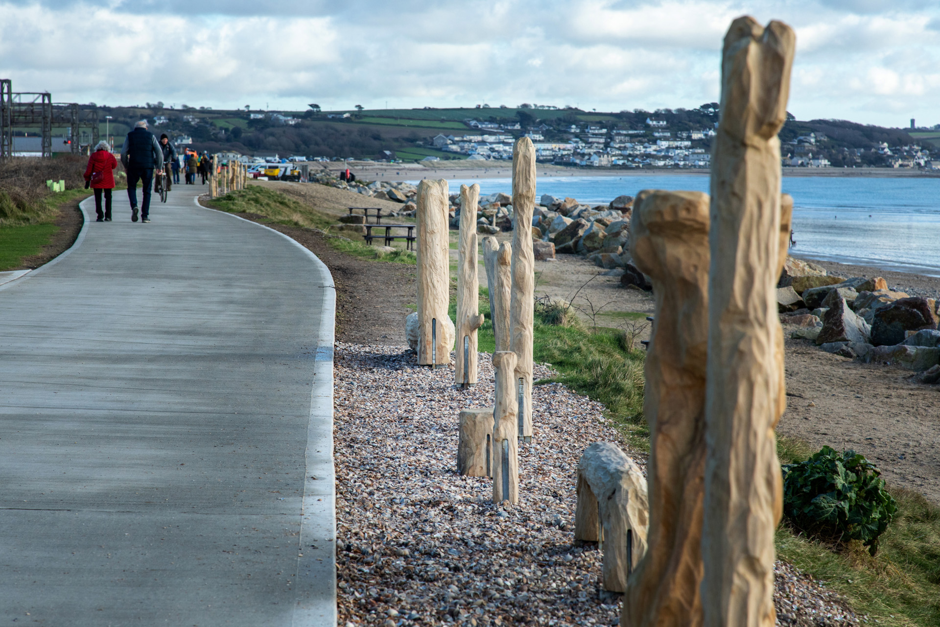 wooden sculptures by the sea