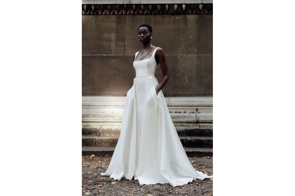 Black woman in white wedding dress