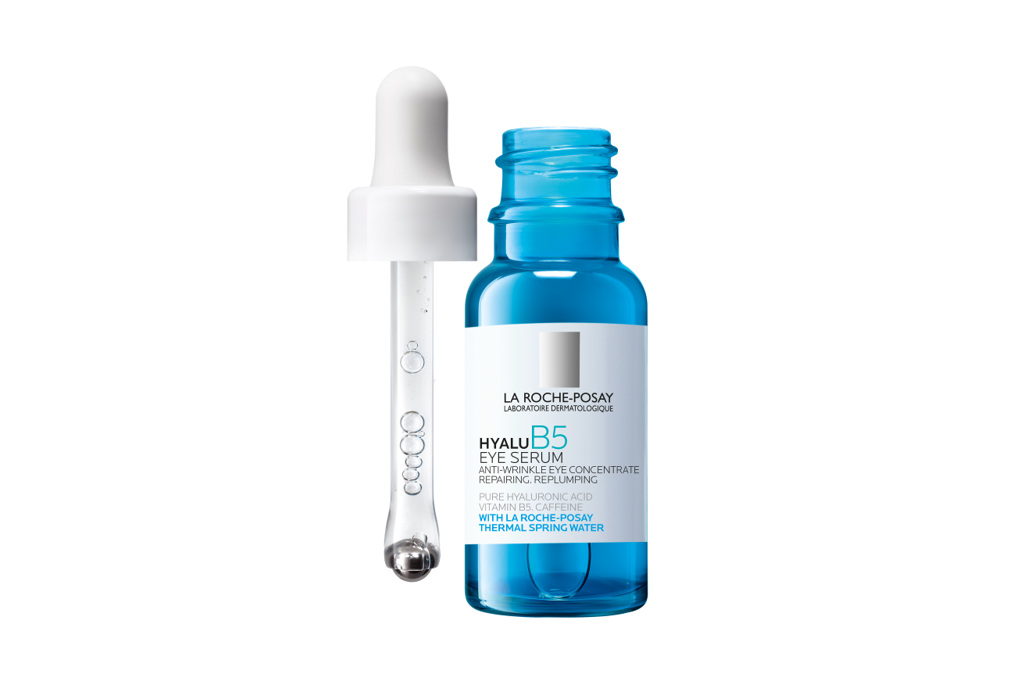 Blue bottle of eye serum with white dropper