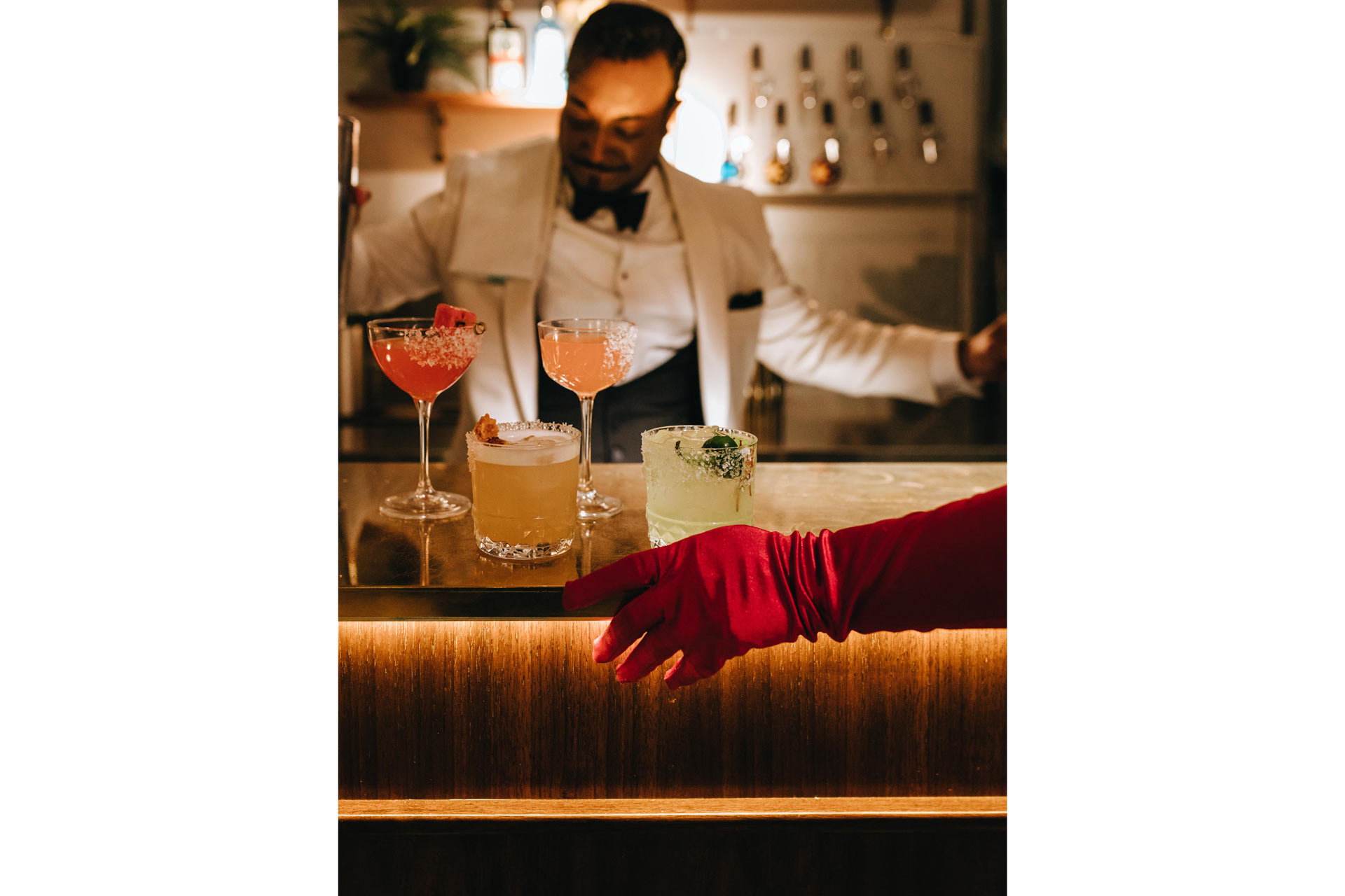Bartender pouring margarita cocktails