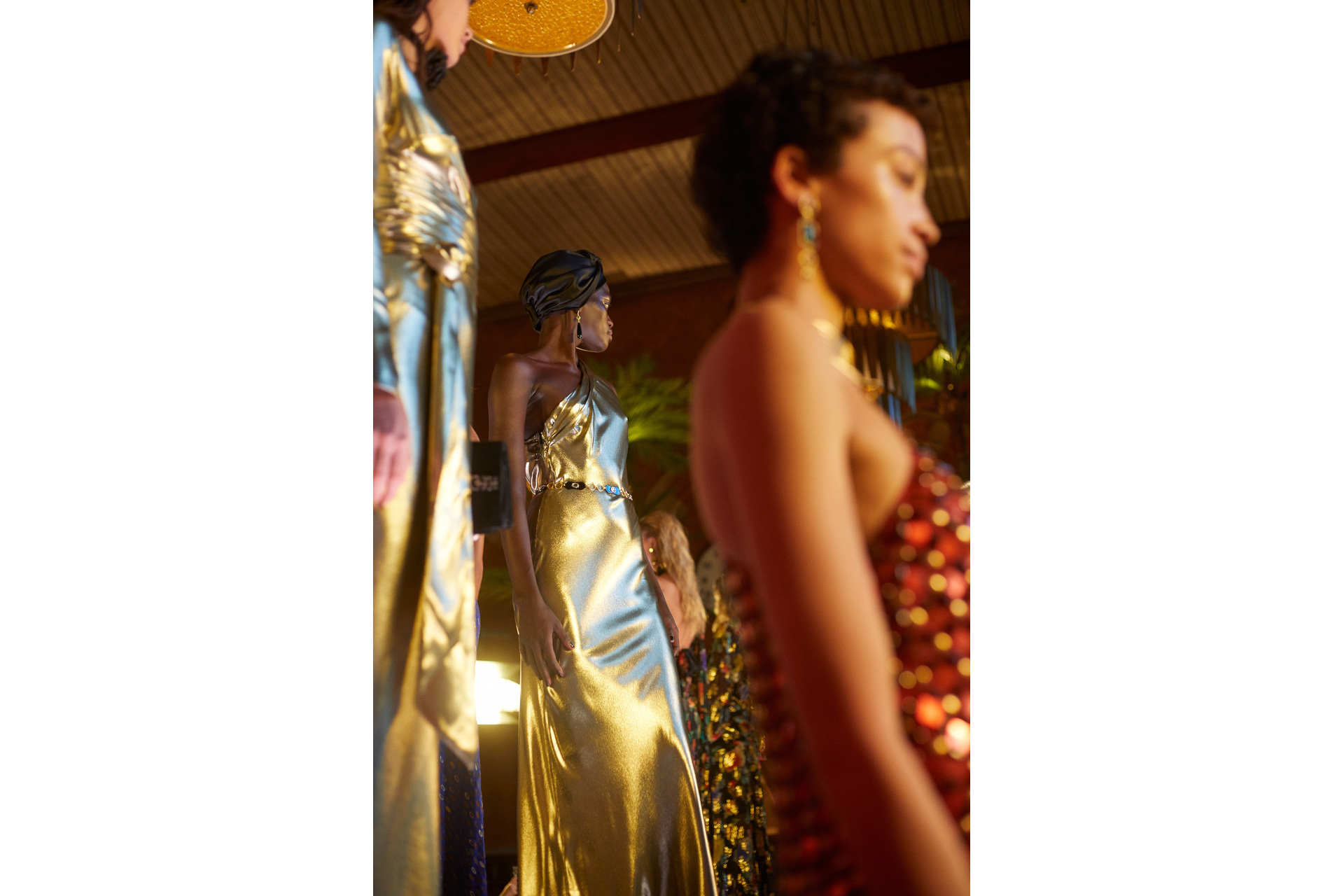 Close up of models in evening dresses