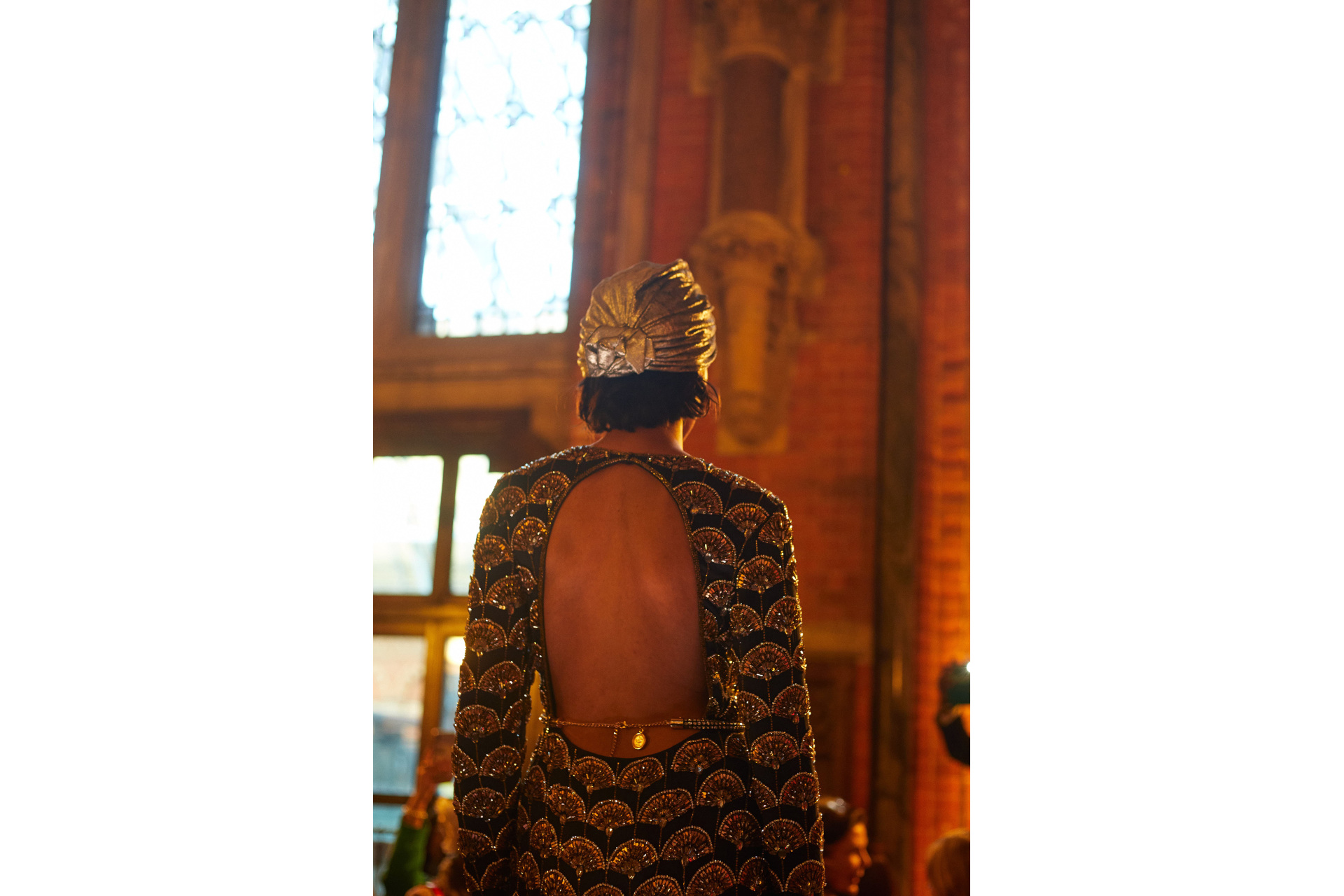 Close up of model wearing backless dress