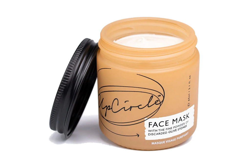 Prange tub with black lid and white face cream inside