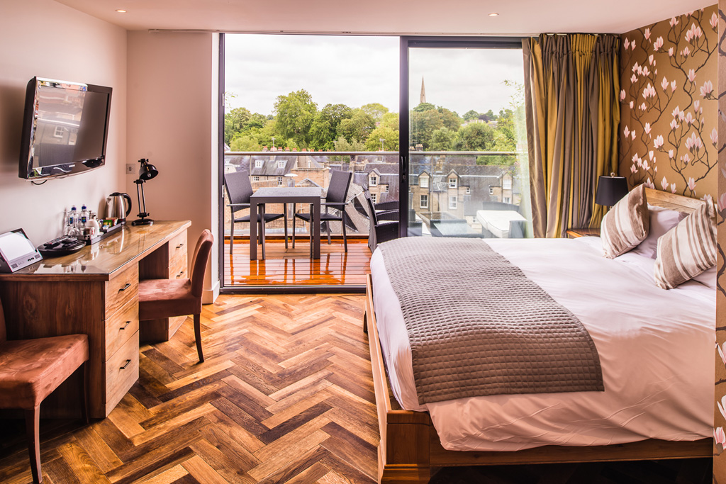 A bedroom with balcony at The Varsity