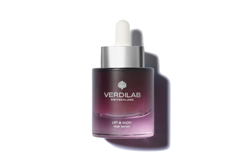 Purple serum bottle with white and silver stopper