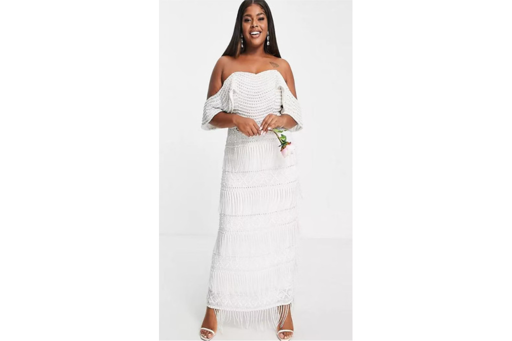 Woman in white fringe dress