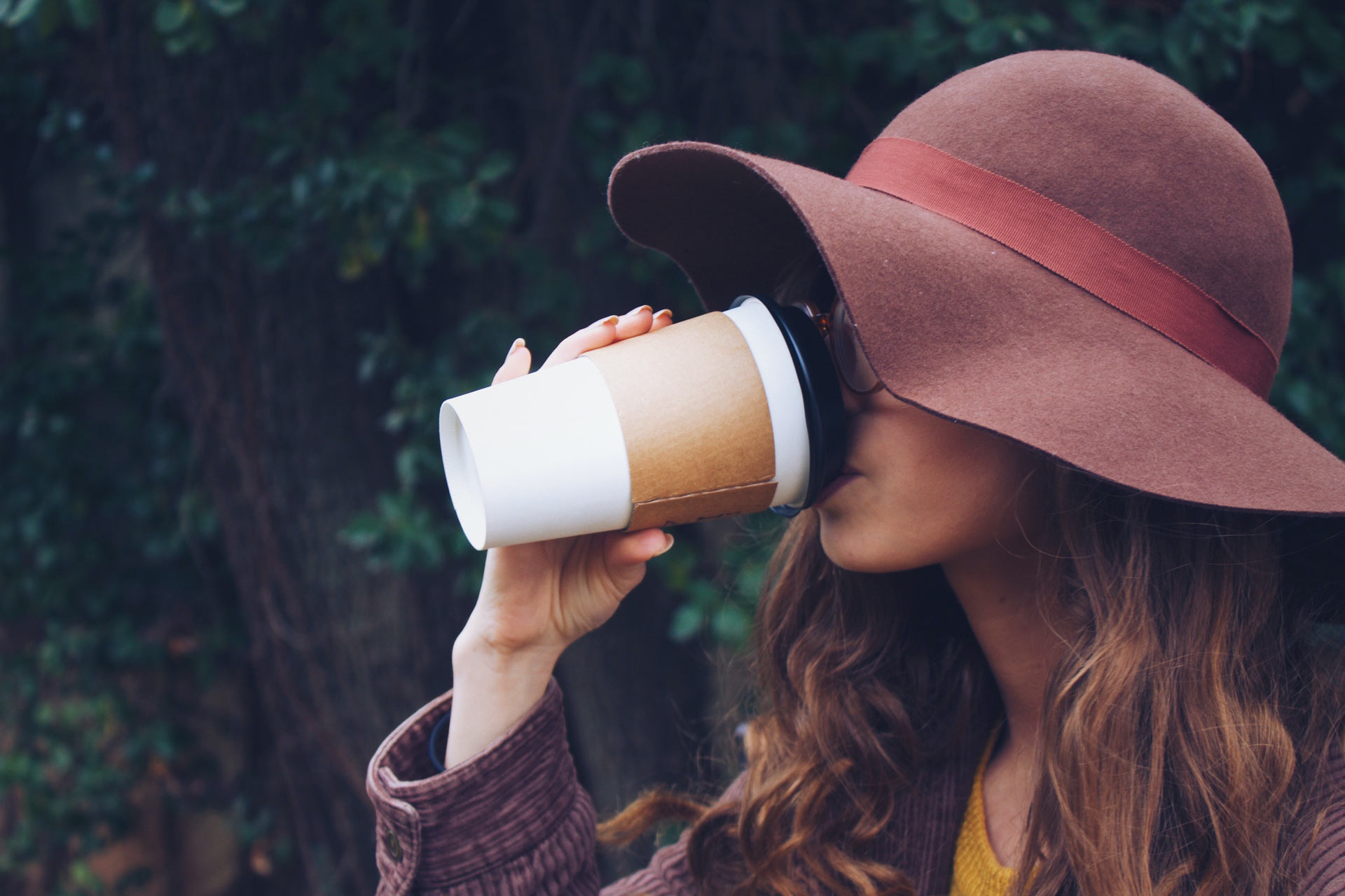 Woman drinking from coffee cup