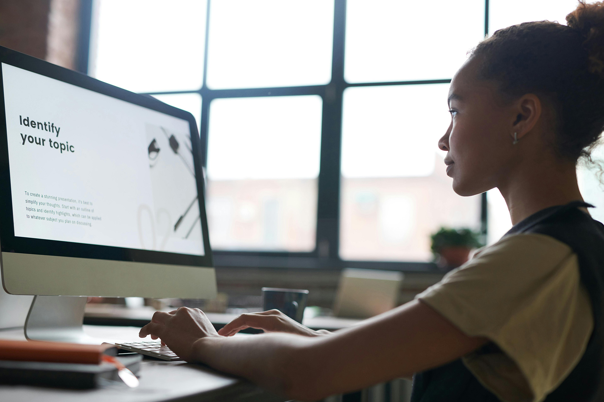 Girl working on her computer