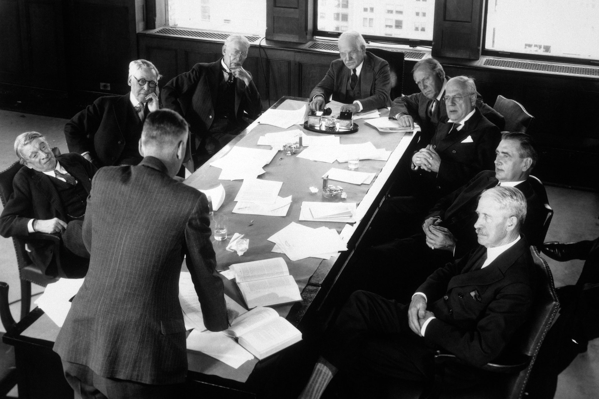 Image of men round a VC boardroom table, intended to show difficulties faced by women in founding companies in article around funding gap