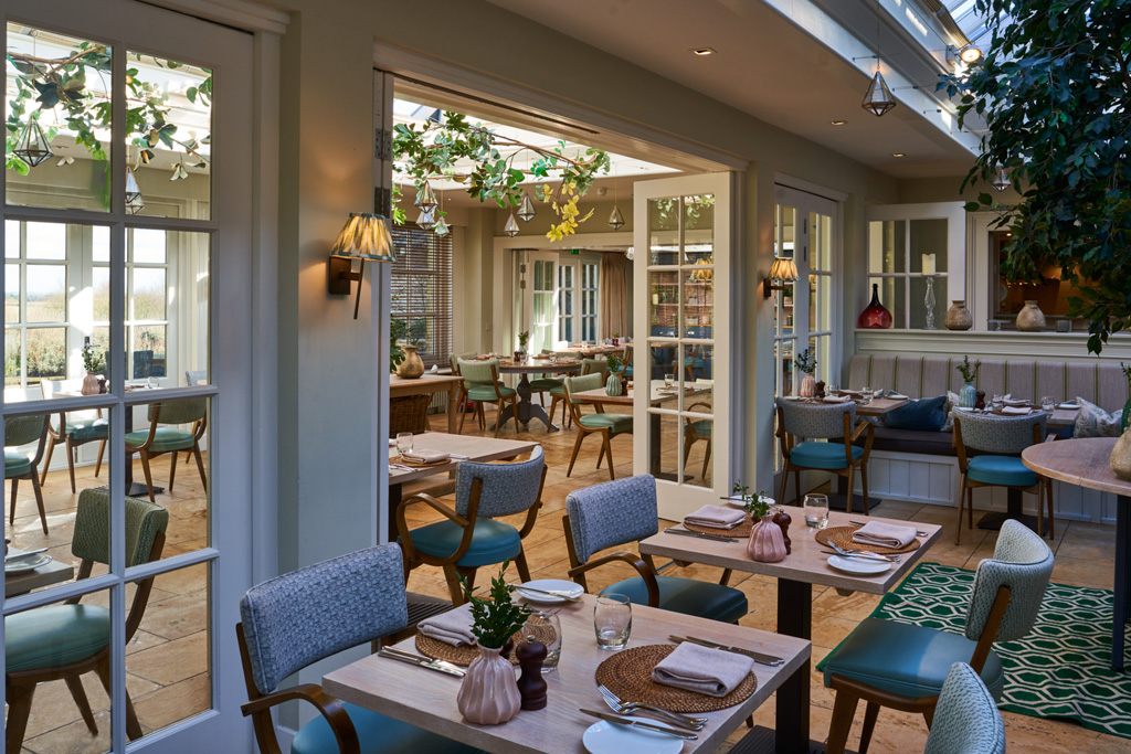 Indoor-outdoor restaurant at Calcot & Spa