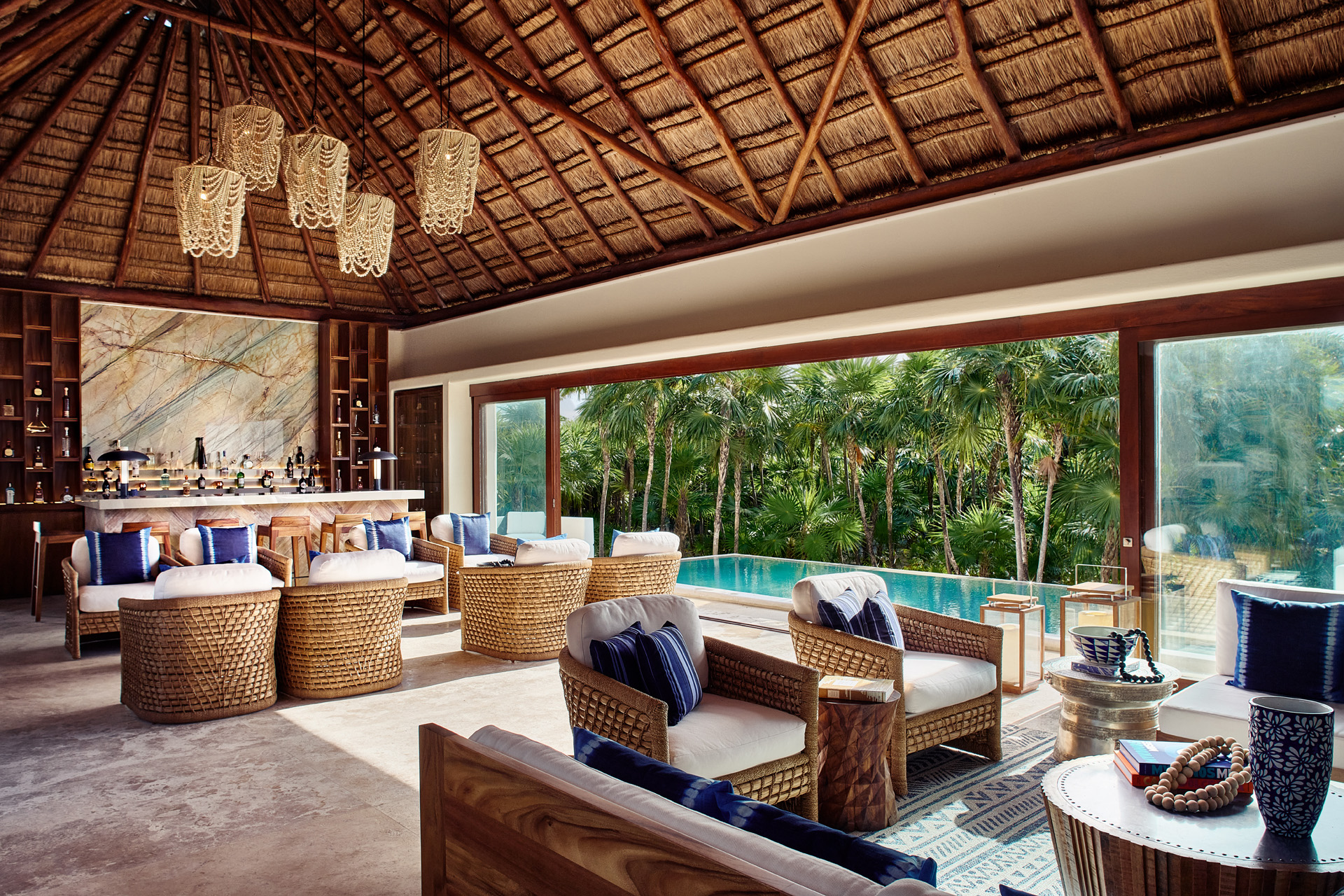 An airy sitting area at Casa Chable beside the pool