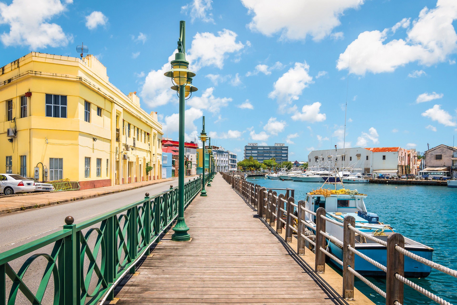 Boardwalk with yellow building beside