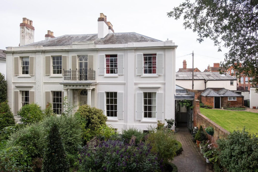 Regency townhouse with slate roof.