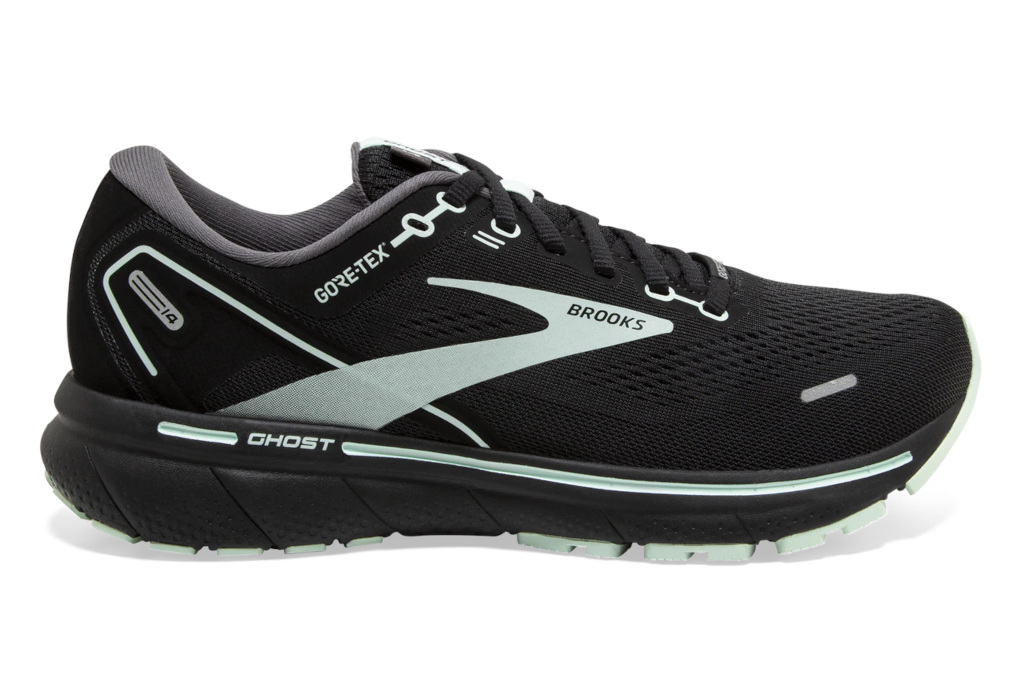Black trainer with silver-blue stripe