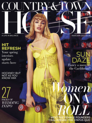 Magazine cover featuring woman in yellow dress