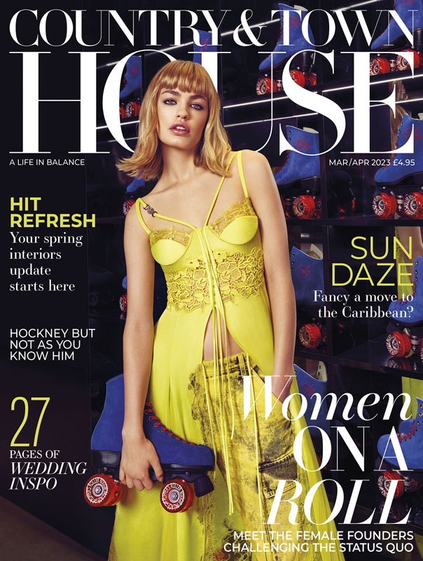 Magazine cover featuring woman in yellow dress
