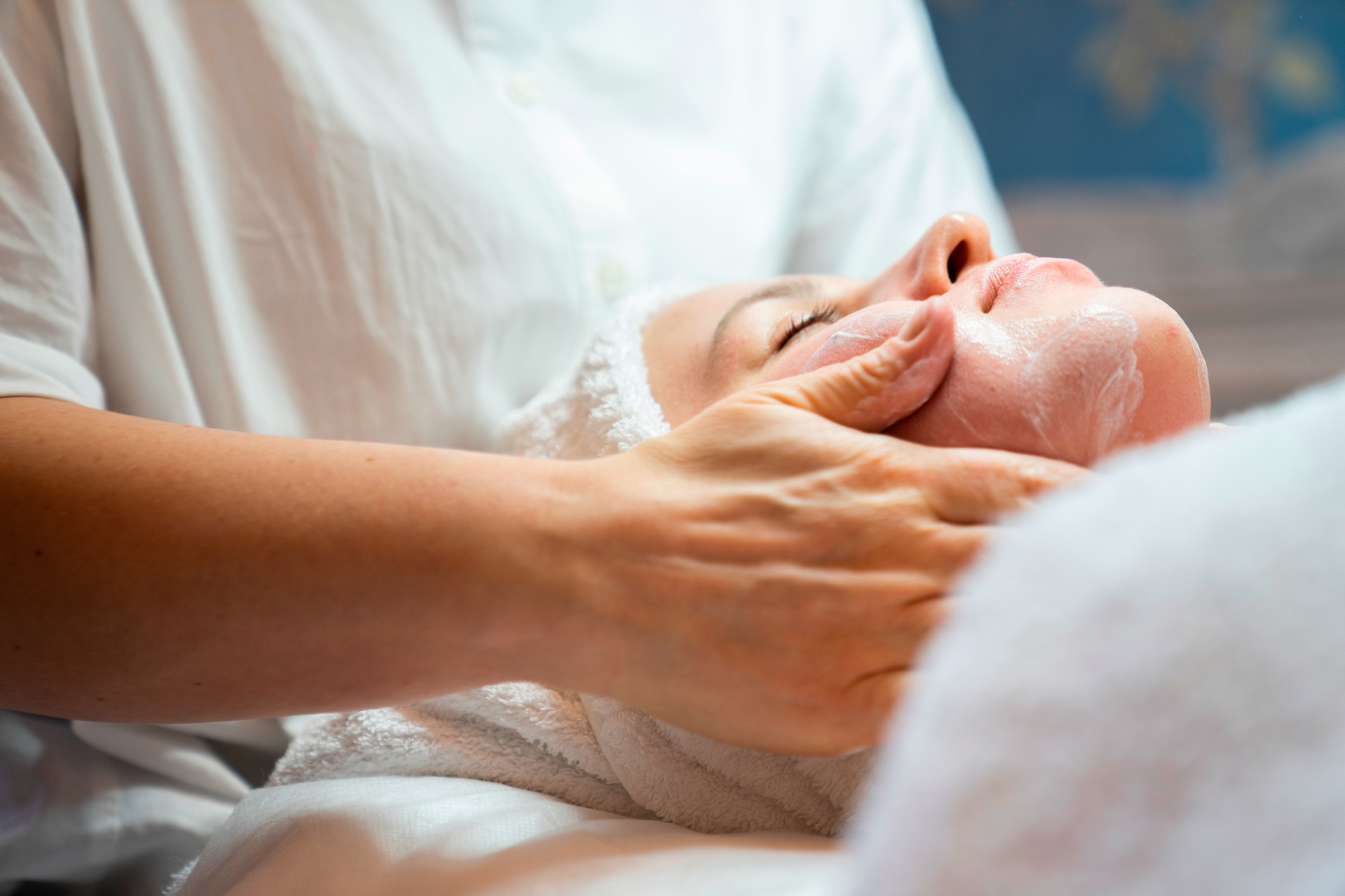 Woman receiving a facial