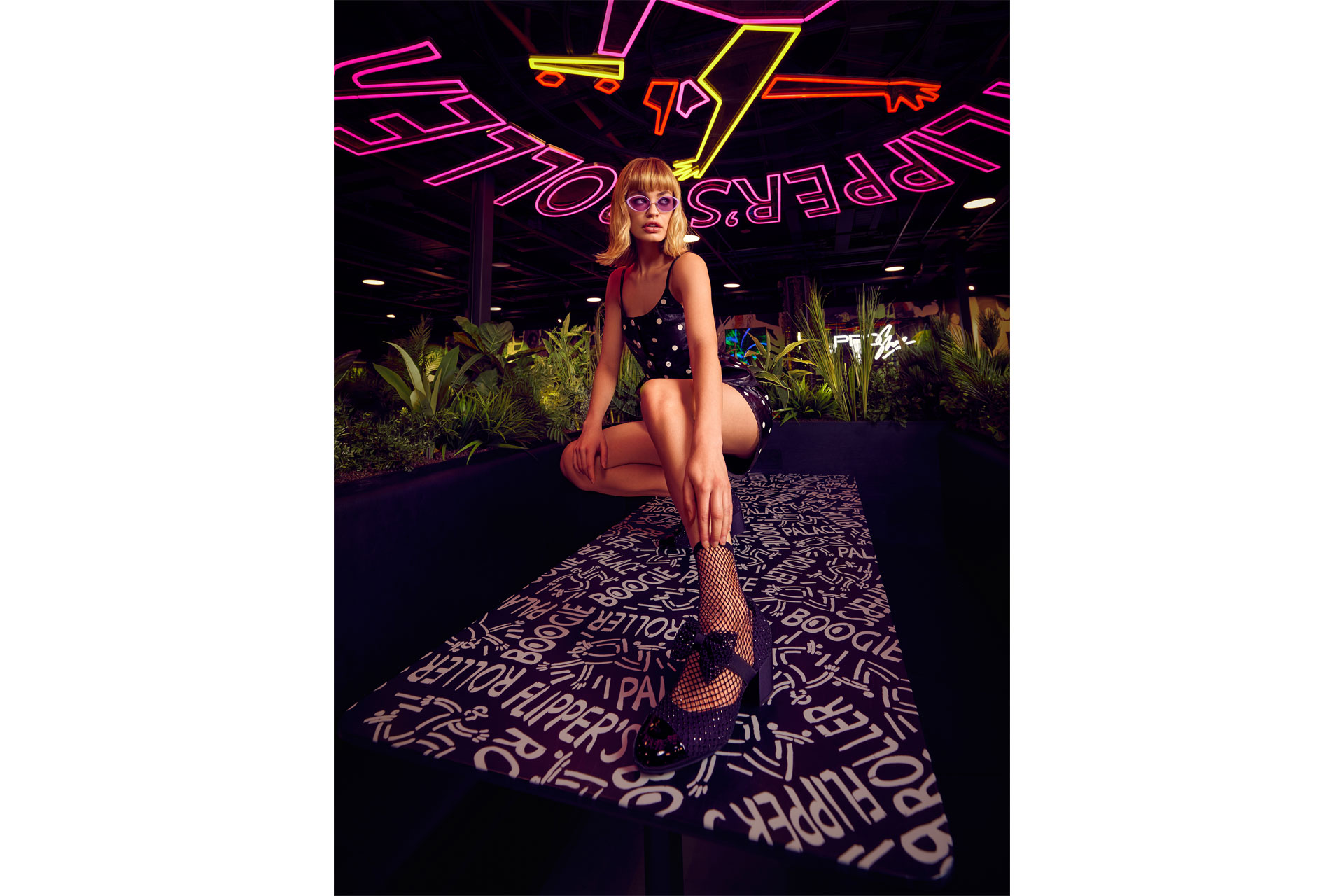 Spring fashion shoot at Flippers Roller Boogie Palace, a model poses