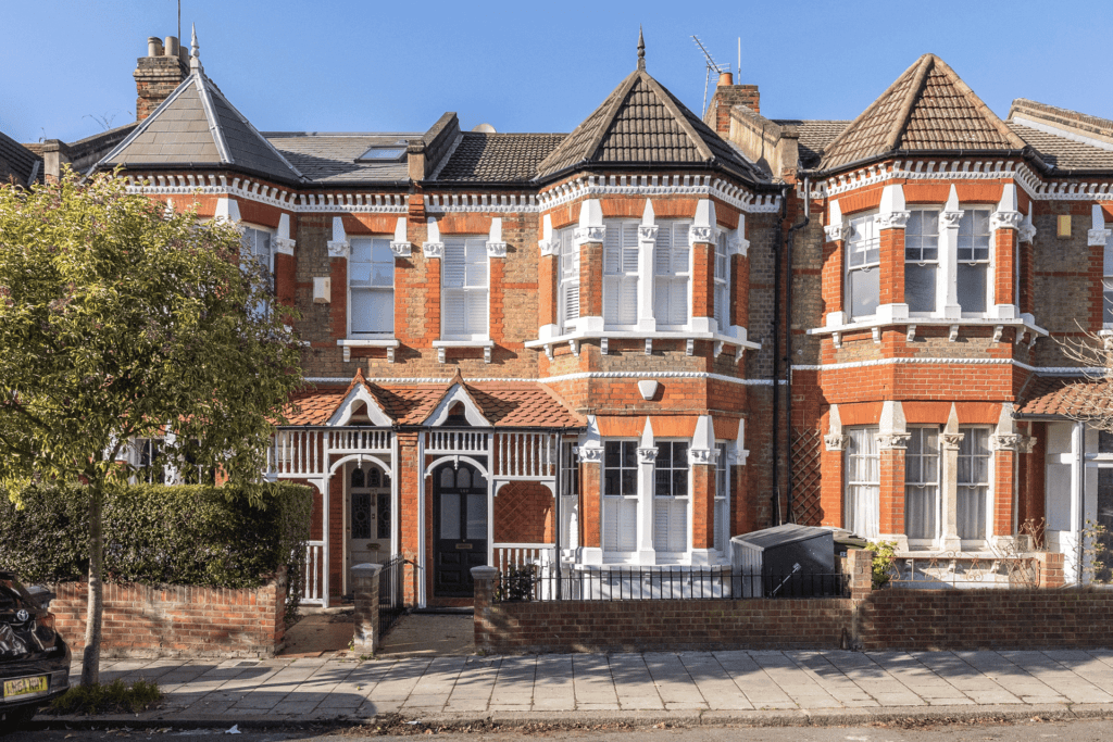Red brick terraced houses with white windows