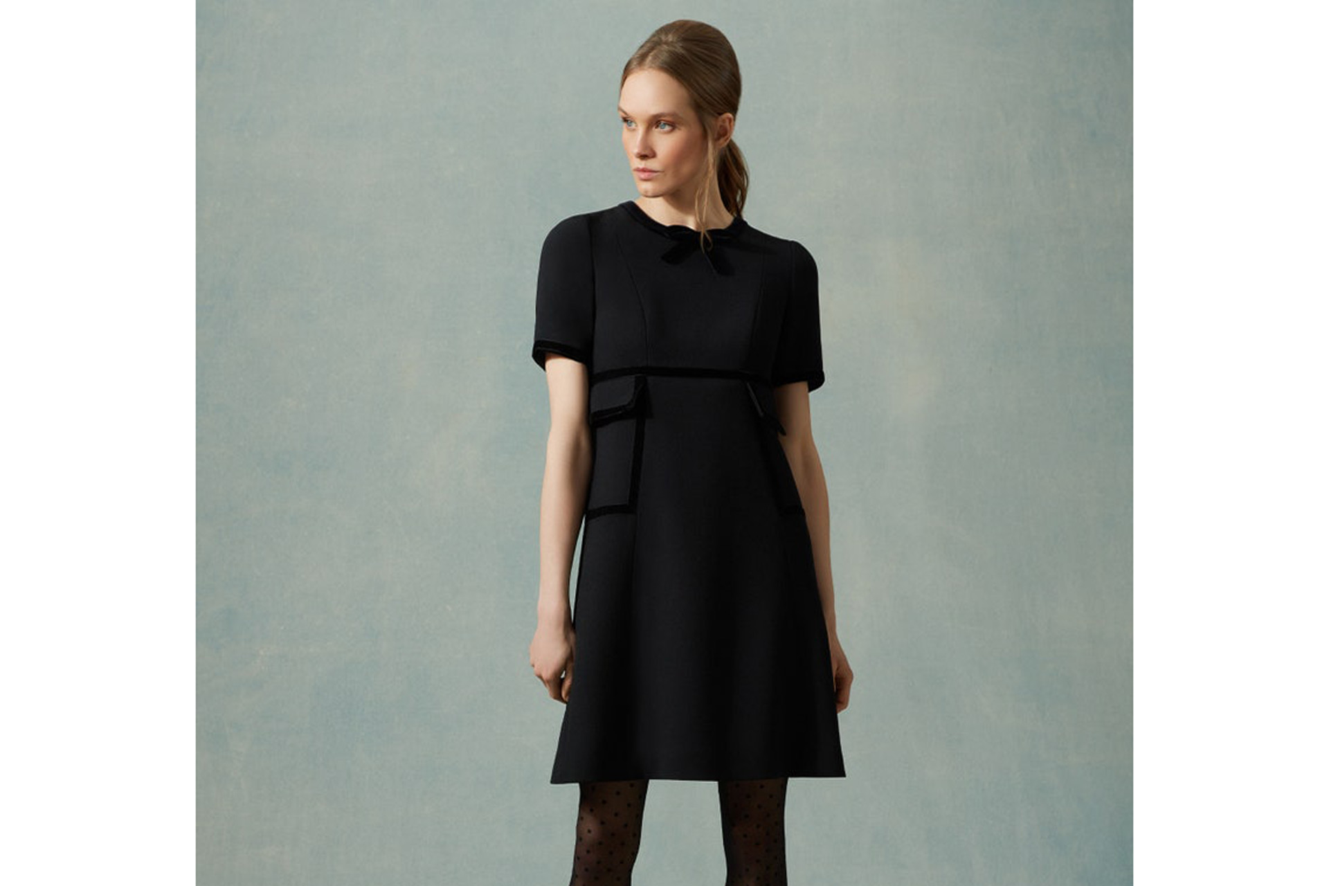 Black shift dress with pockets.
