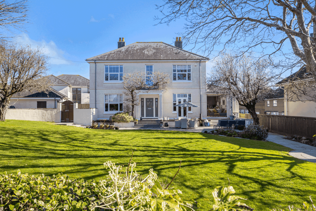 Large manor house with gardens in front