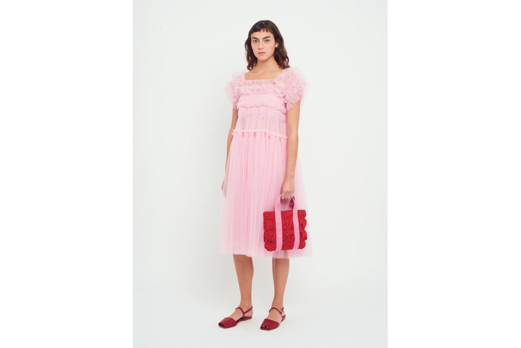 Woman in short pink tulle dress
