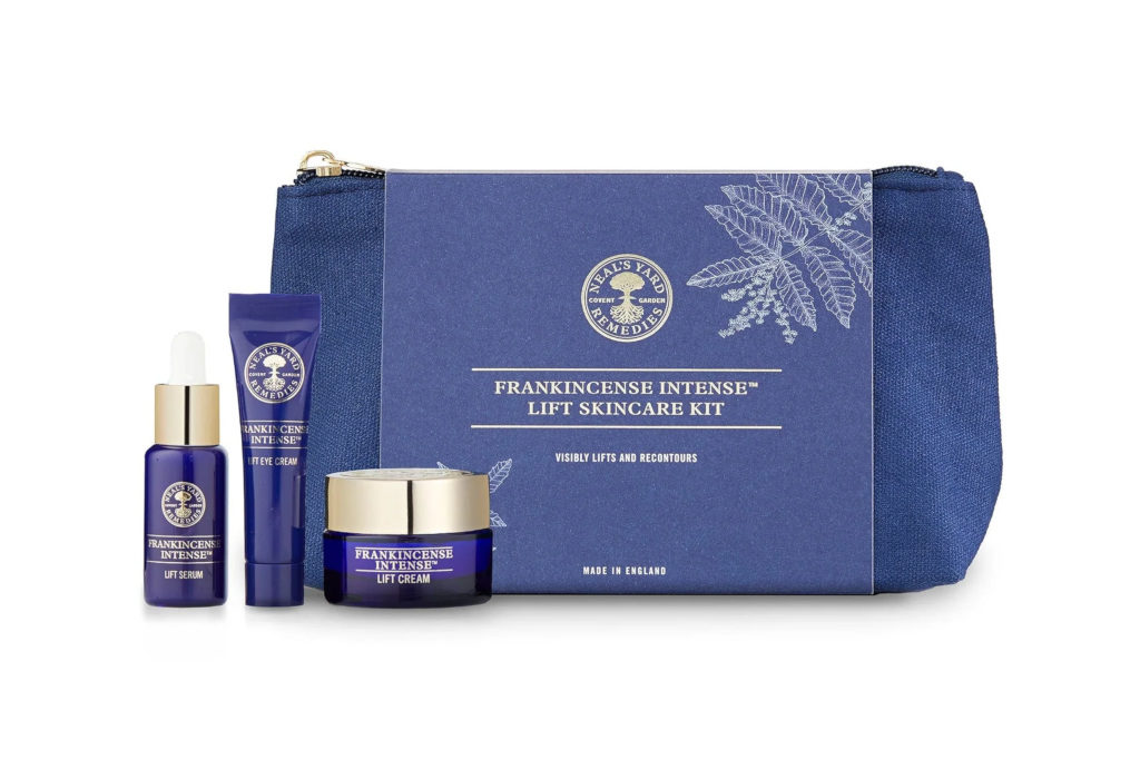 Blue bottles and tubs next to matching bag