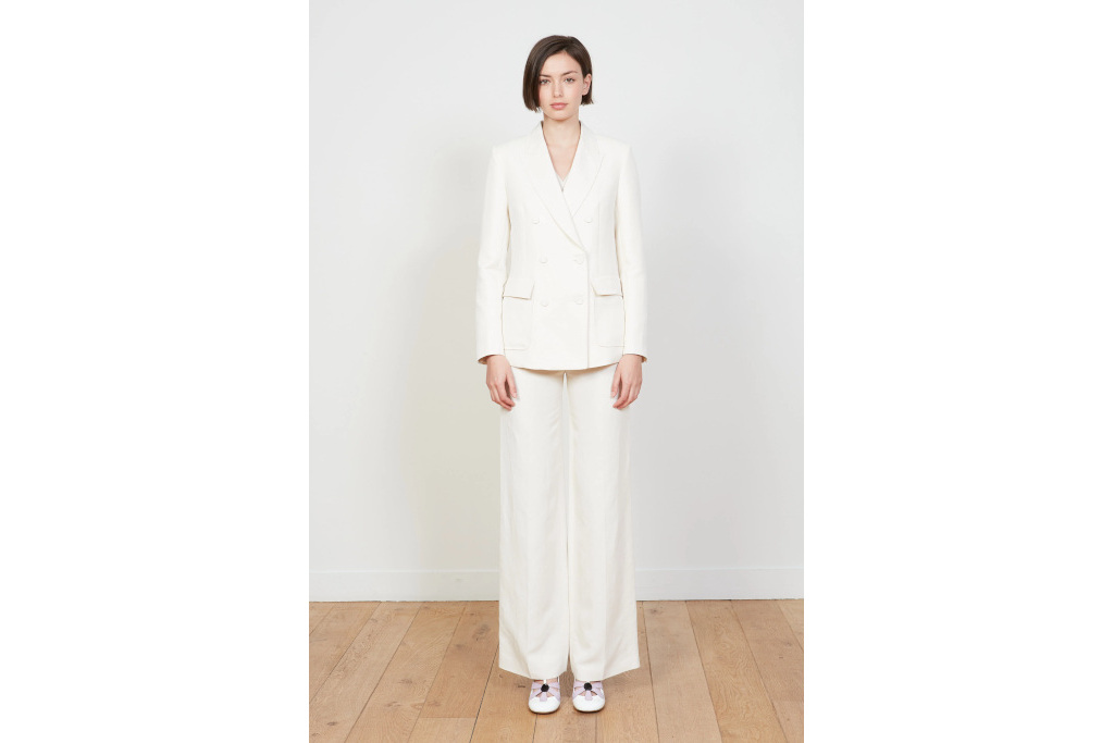 Woman in white suit