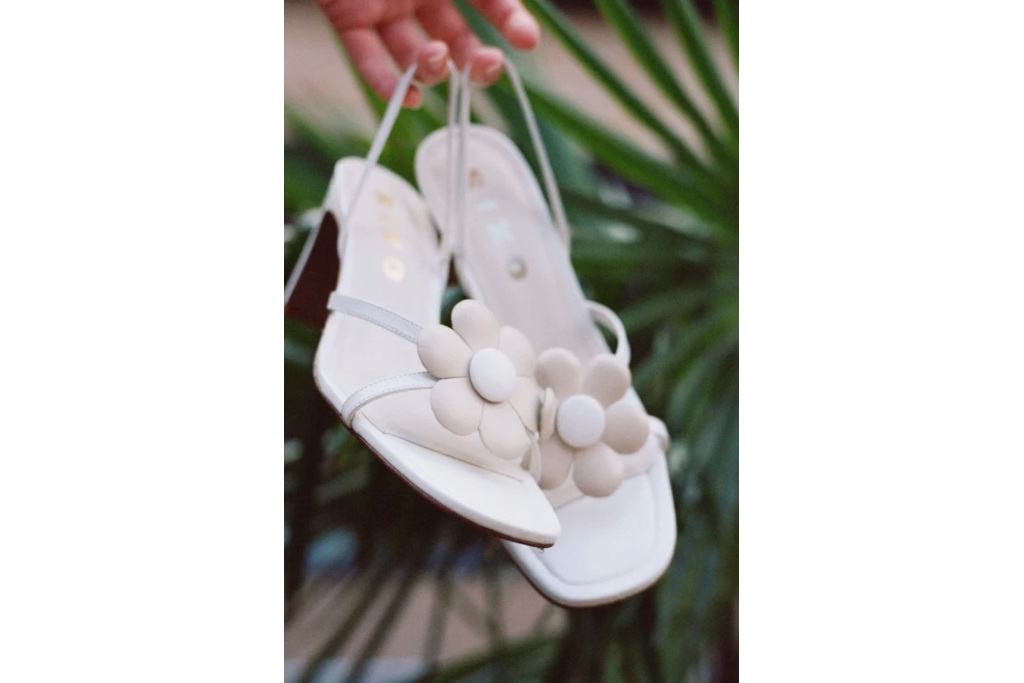 Ivory heels with flowers on the front