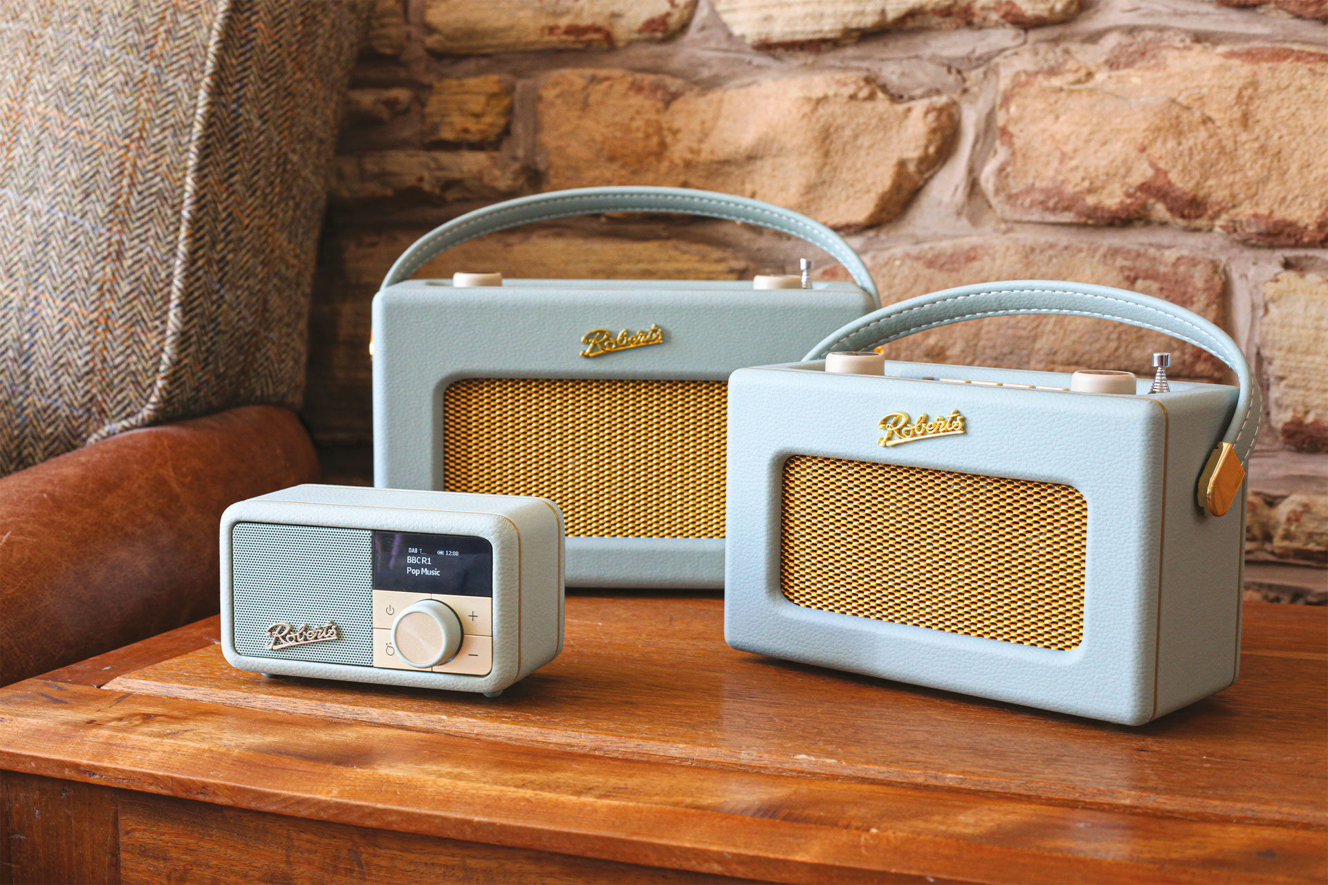 Three blue Roberts Radios