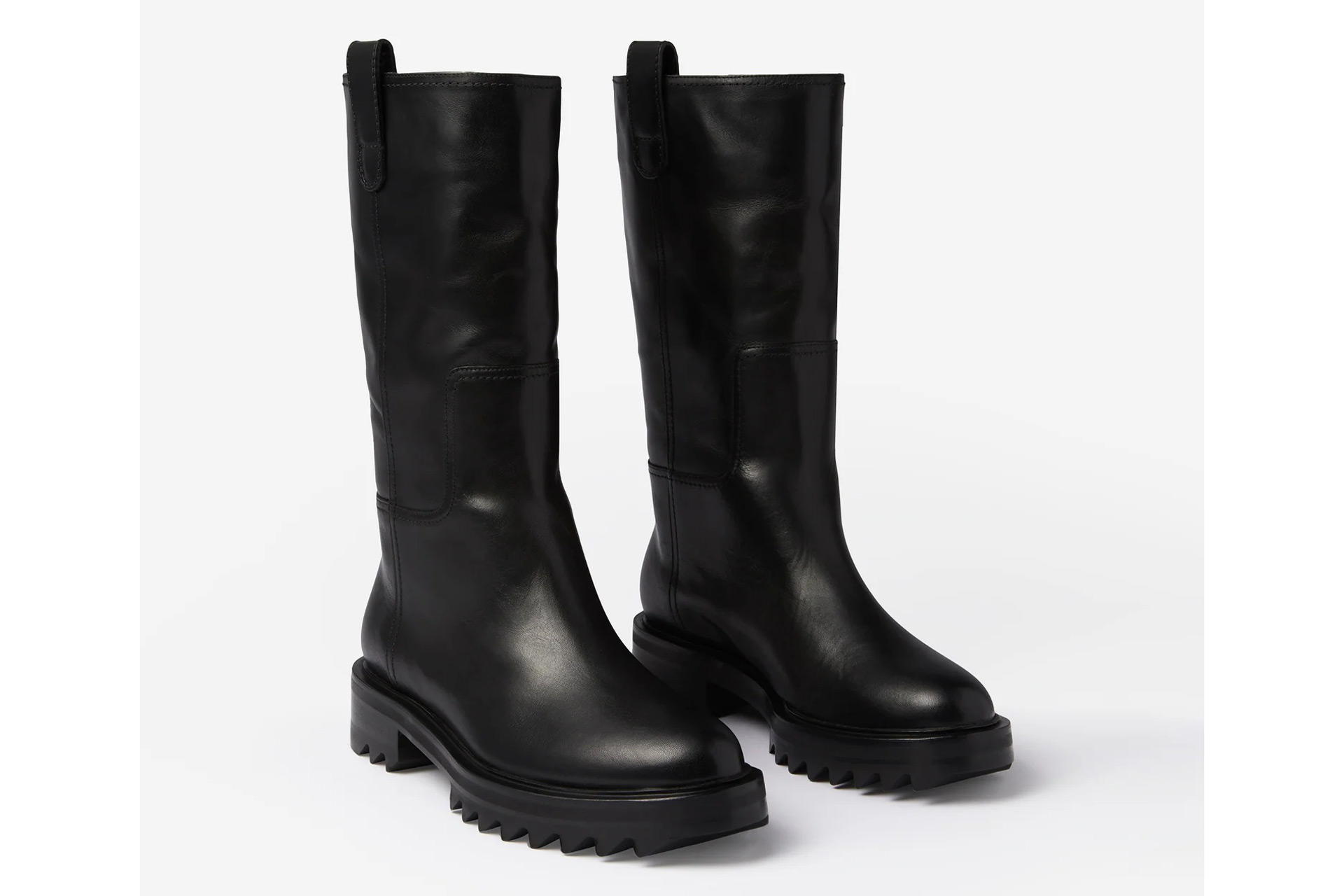 Black leather mid-calf leather boots with pull on tab at top.