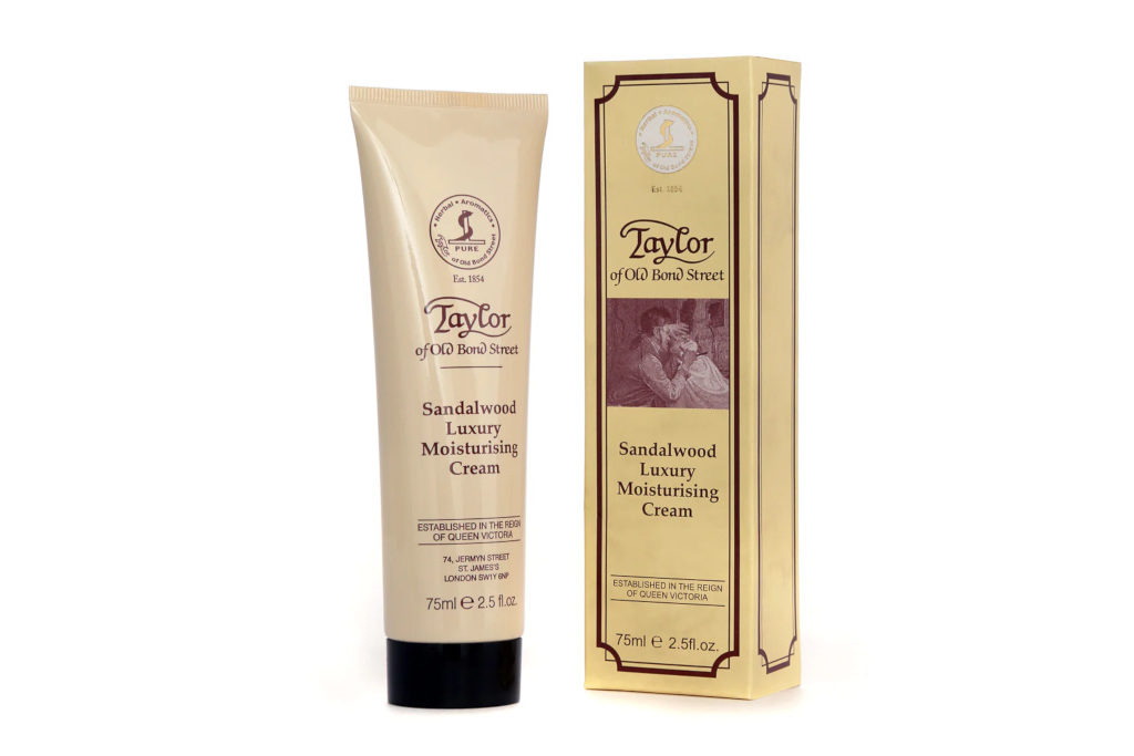 Tube of moisturiser by cream old-fashioned box