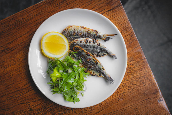 A plate of fish and vegetables at The Parakeet, London