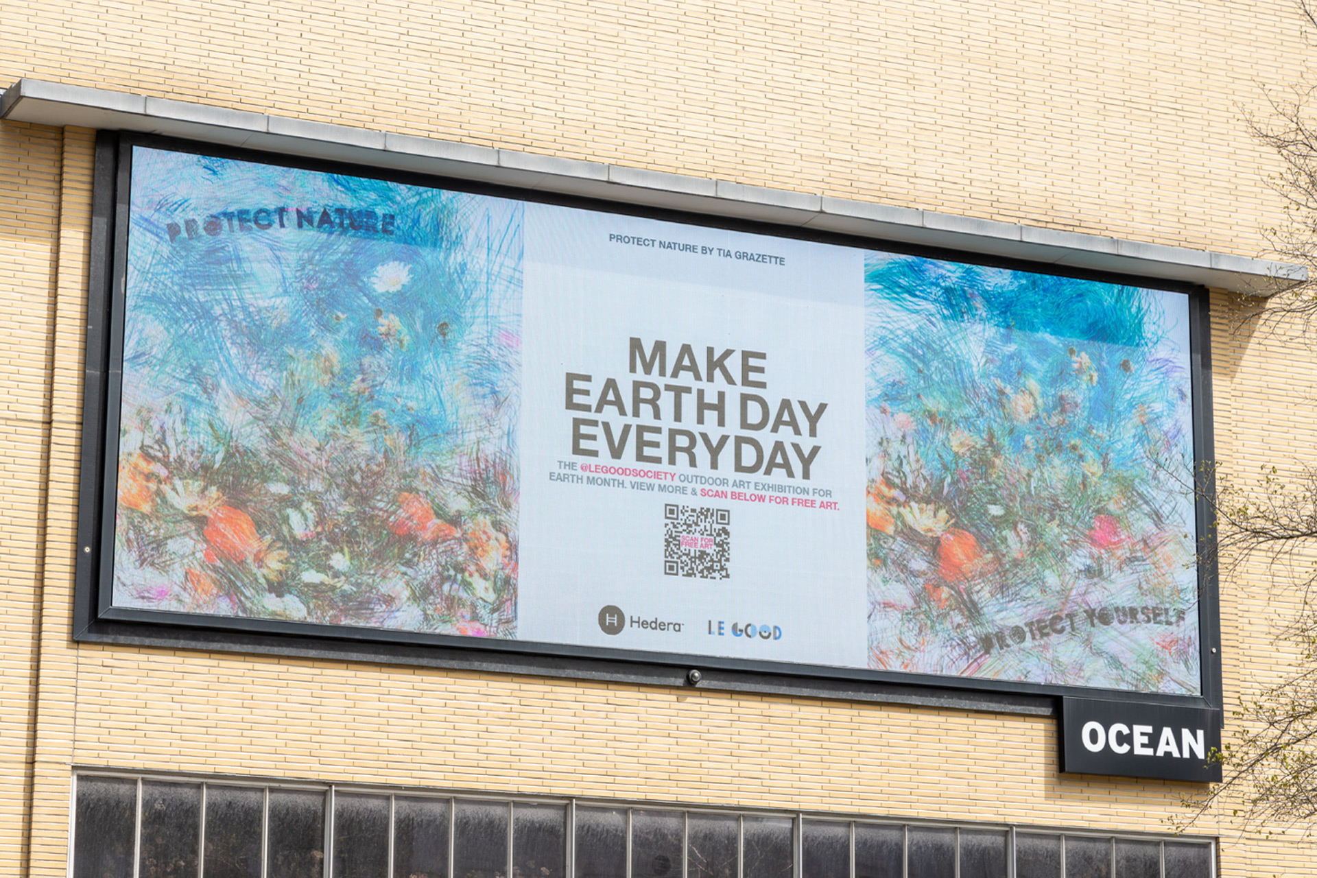 Digital billboard with the phrase 'Make Earth Day Every Day.'