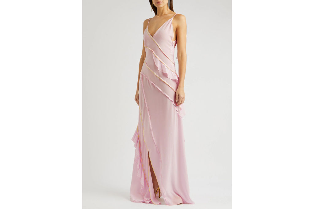 Woman in pink ruffle dress