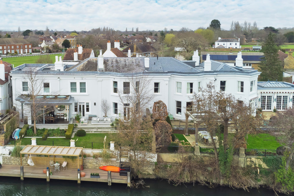 Riverside property with terrace and private mooring.
