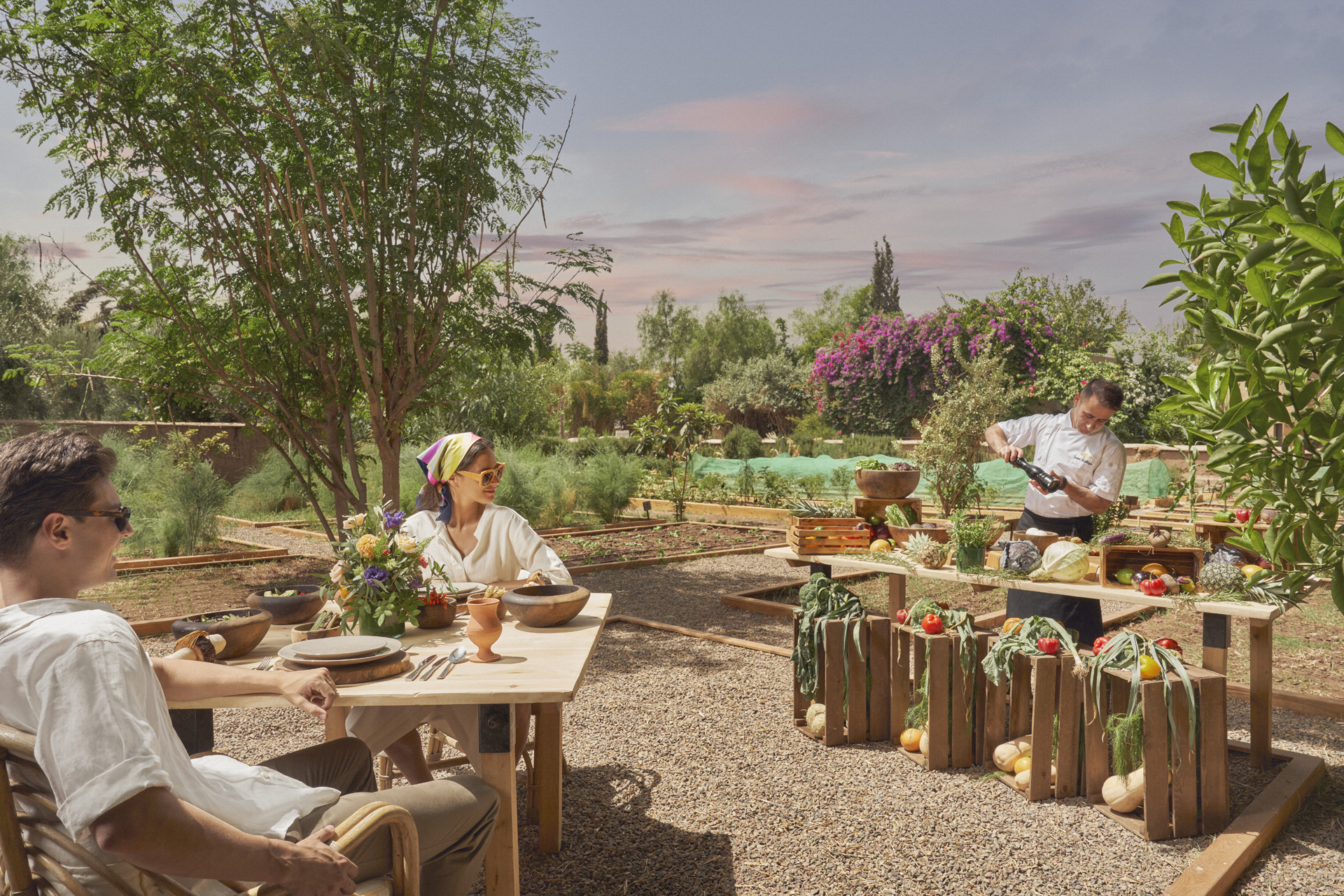 Two people dining in the kitchen garden at Mandarin Oriental Marrakech