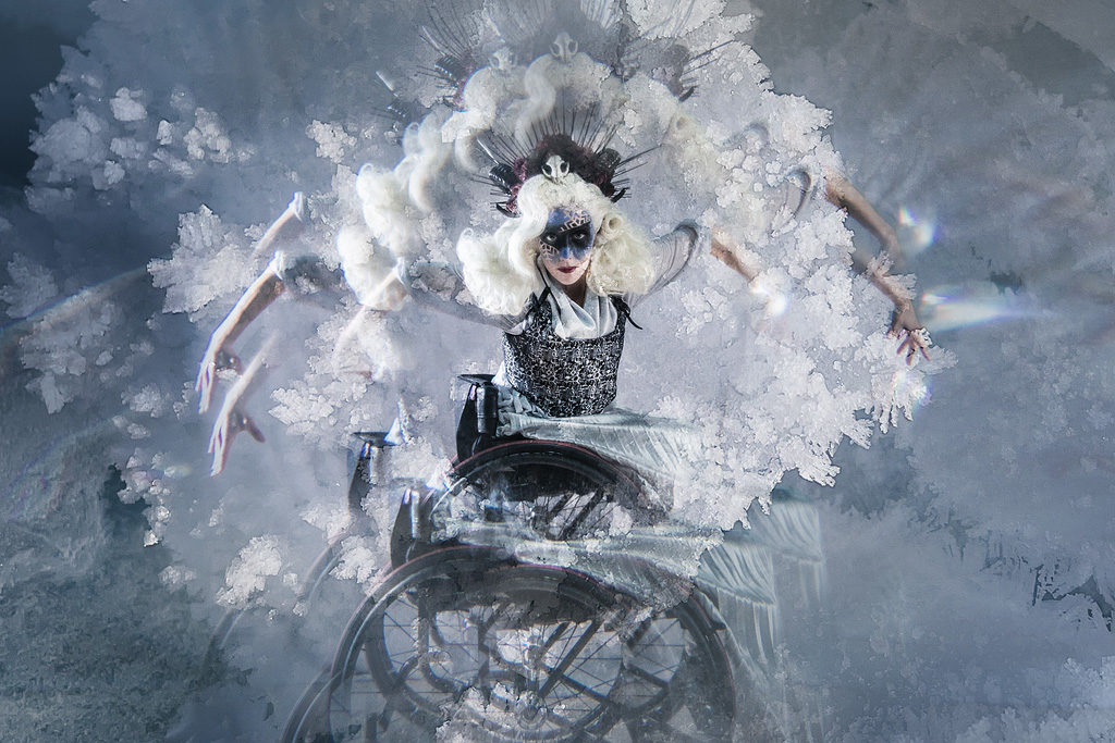 a person in a wheelchair in costume for the snow queen