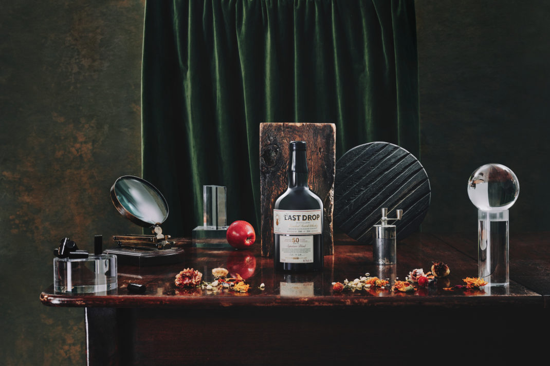 the last drop distillers whisky bottles on table