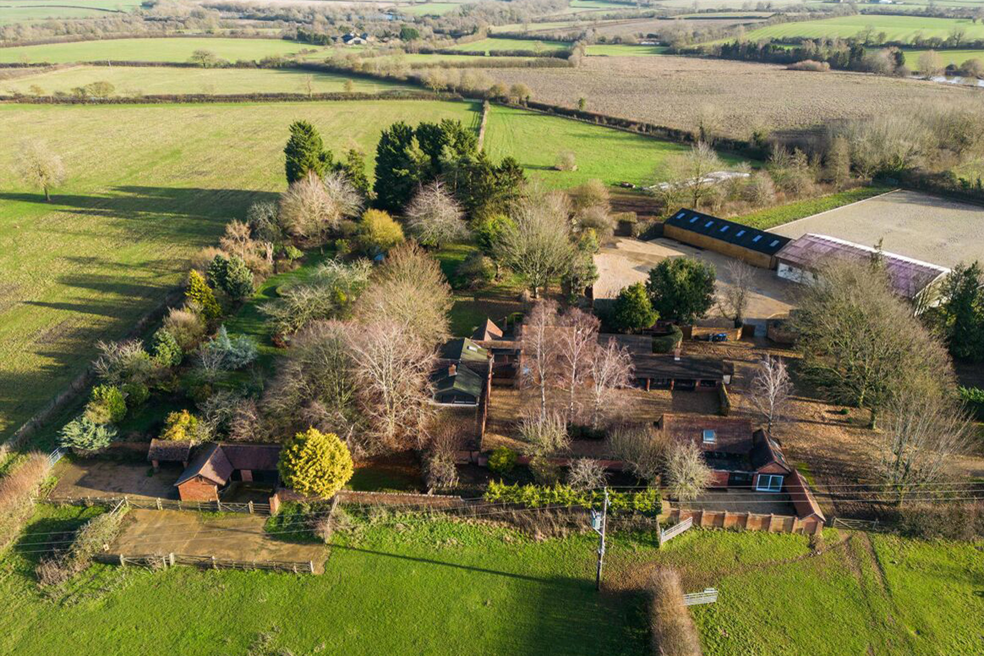 Aerial view of country estate with paddocks surrounding.
