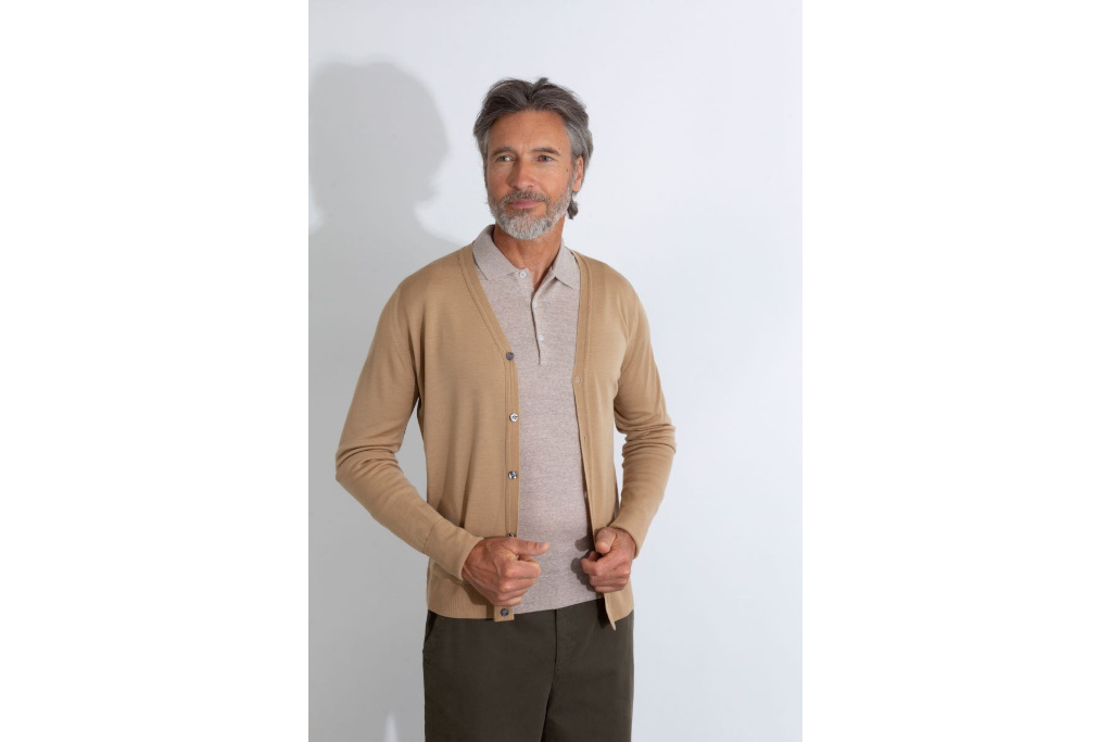 Man in beige cardigan