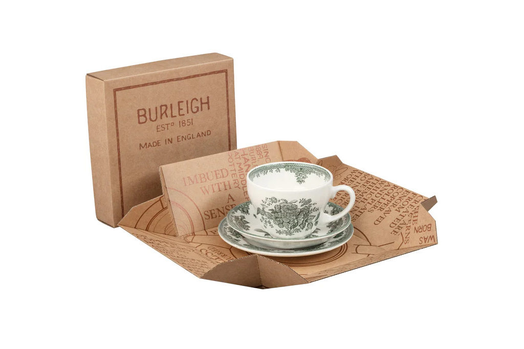 Green tea cup and saucer in brown box and paper