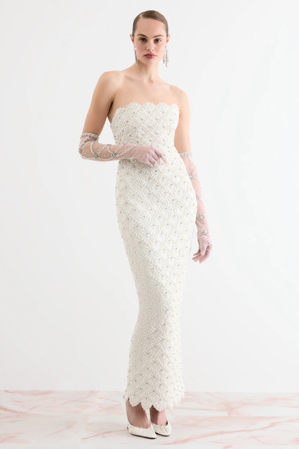 Woman in scalloped gown